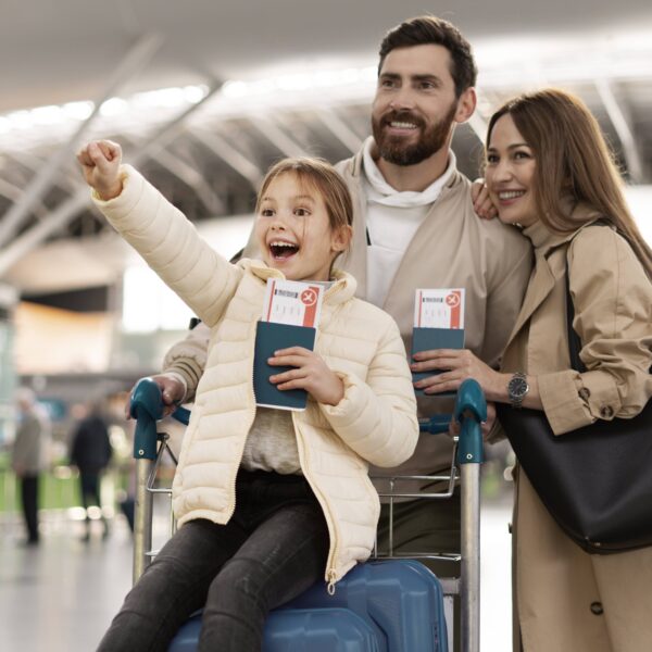 medium-shot-happy-family-airport-min
